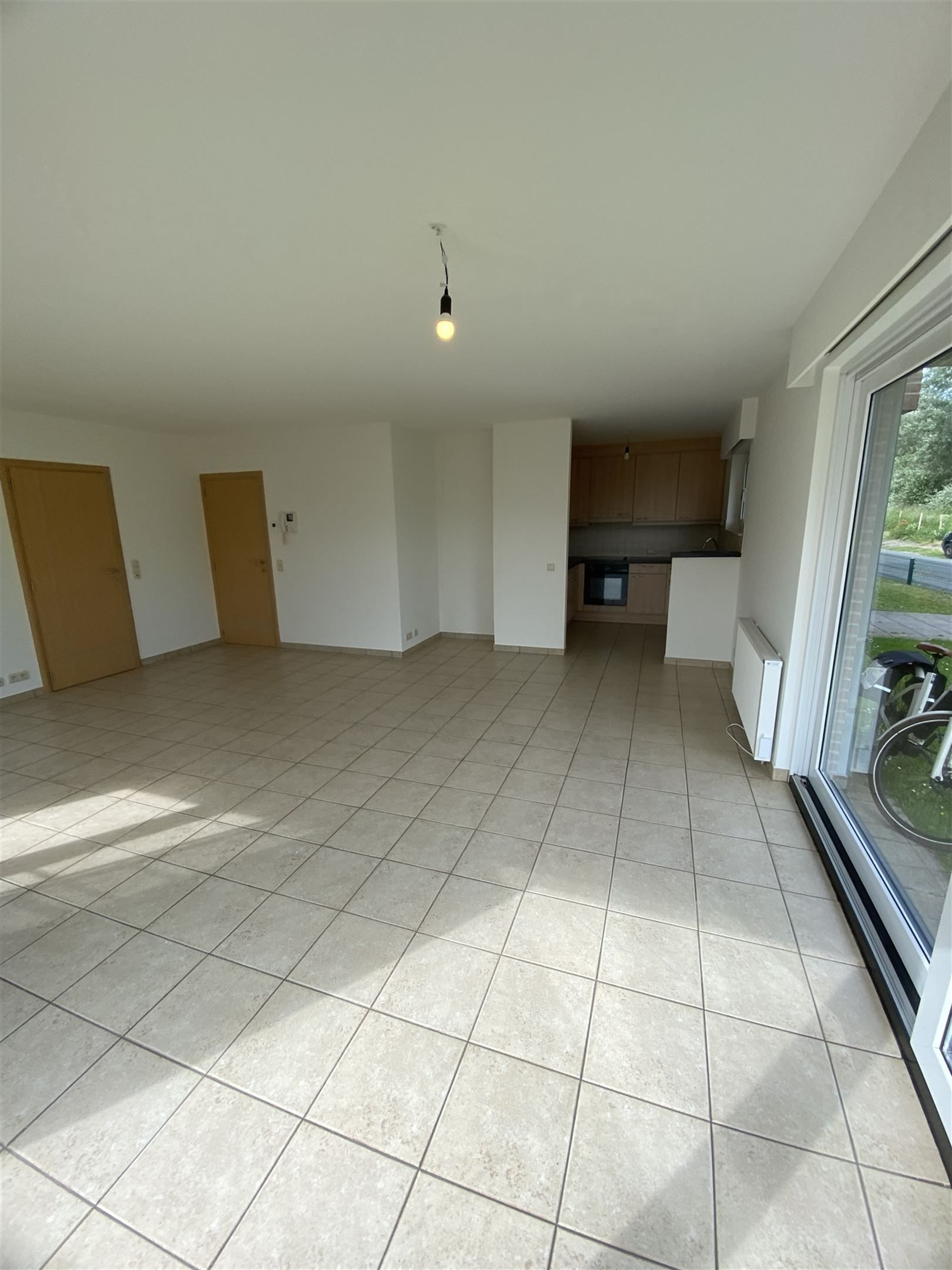 gelijkvloers appartement met garage foto 7
