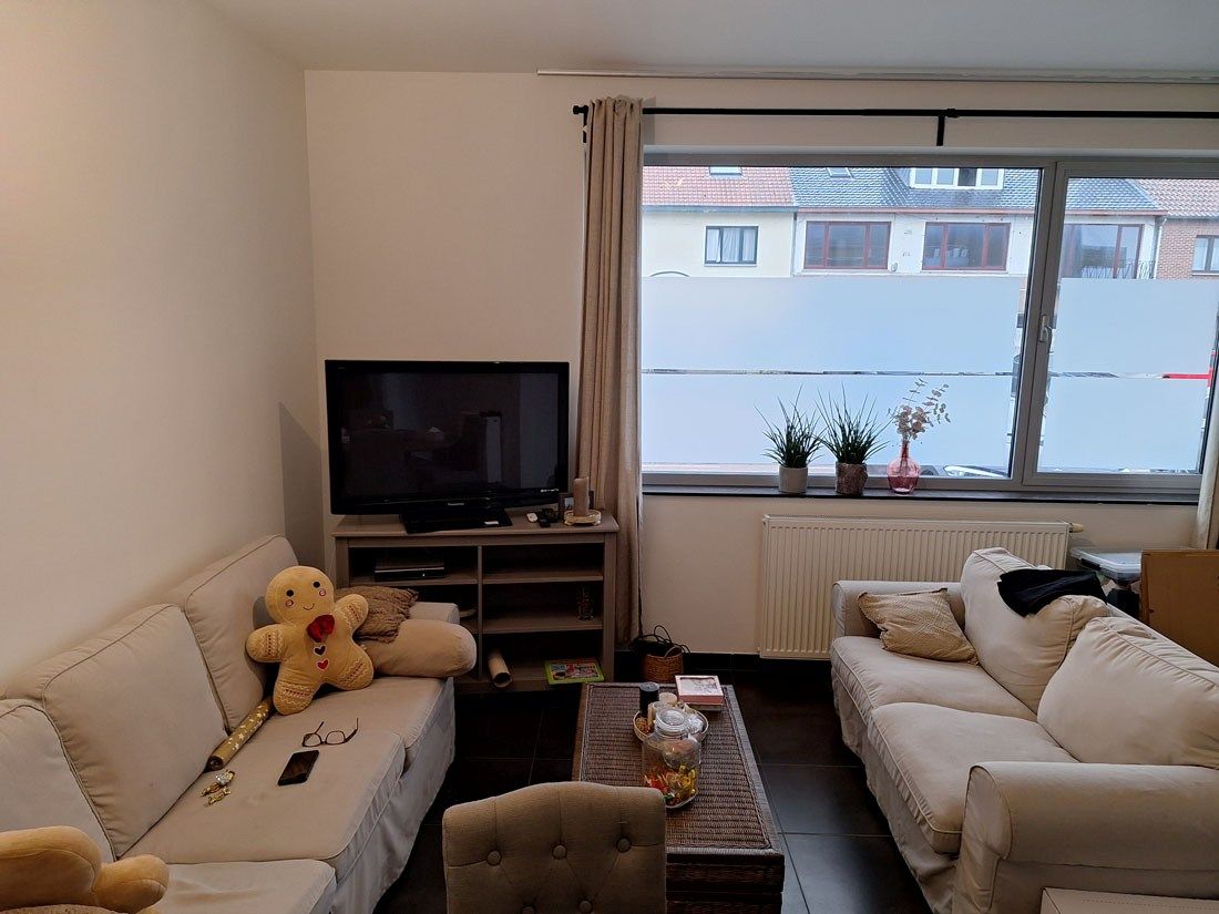 Knus gelijkvloers appartement met leuk zonneterras en tuintje foto 4