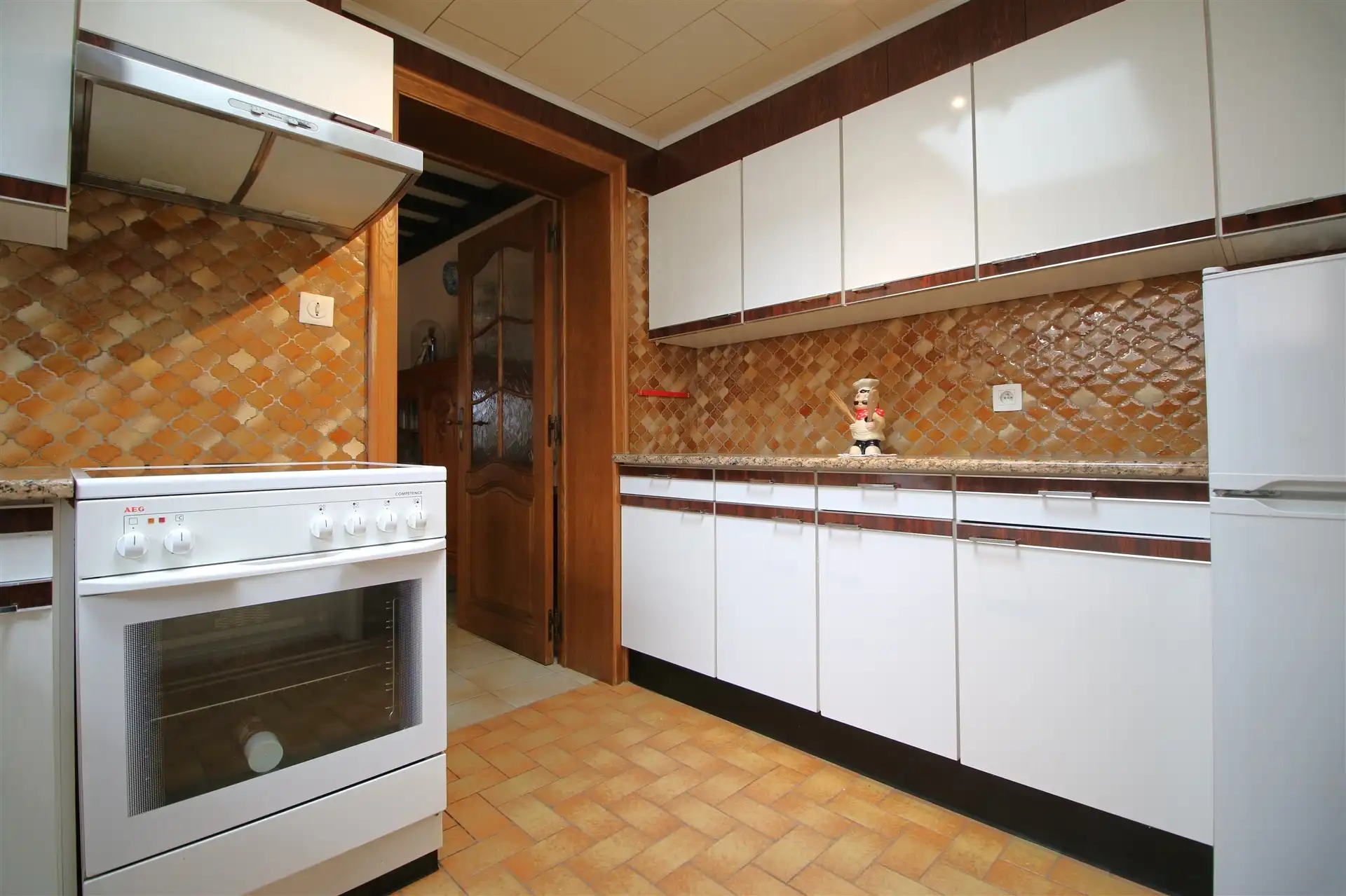 Ruime woning met garage, 4 slpk & tuin foto 6