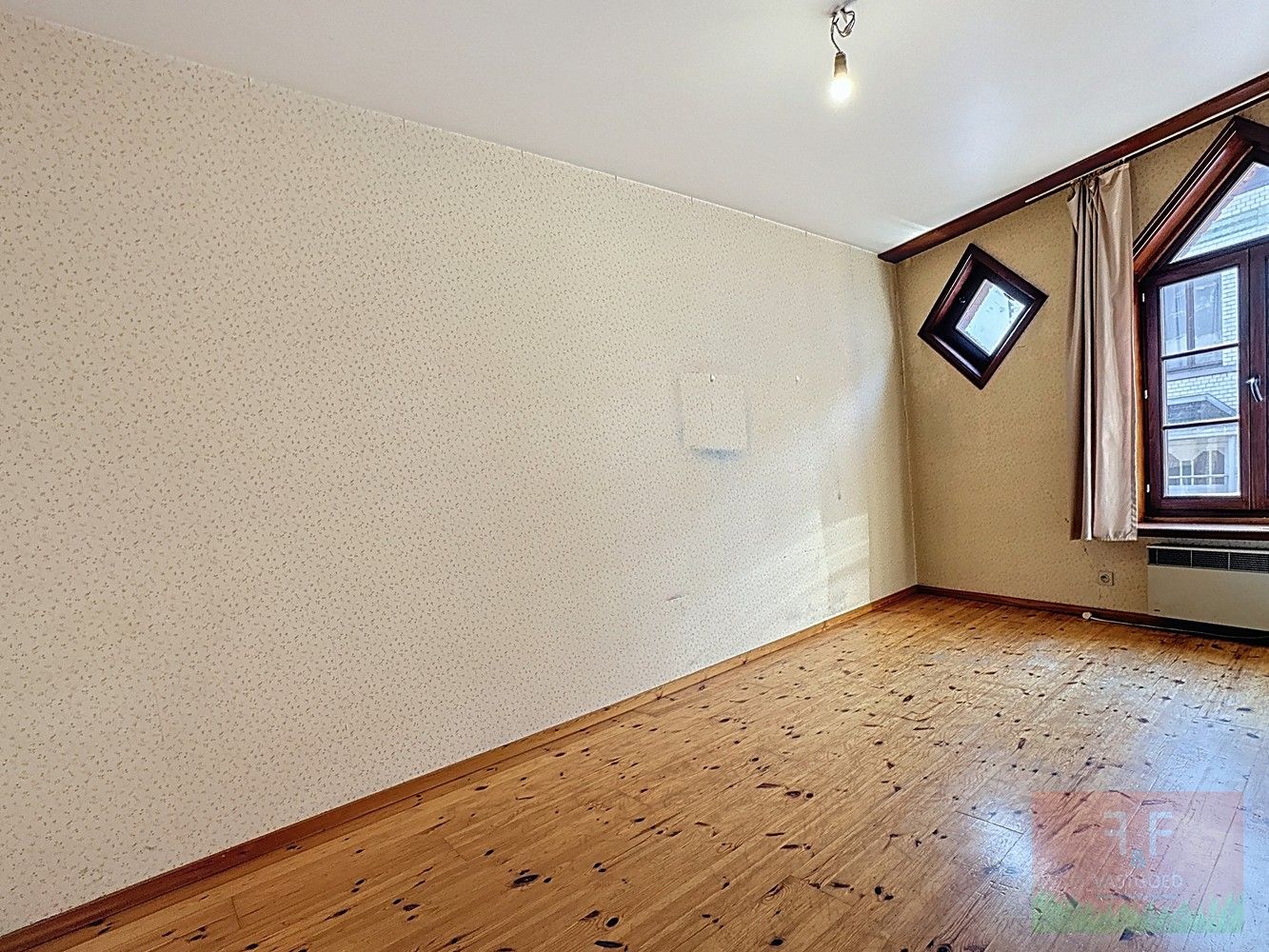 Winkelruimte en triplex appartement met 4 slaapkamers en aparte garage foto 16