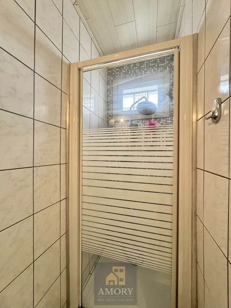 Halfopen woning met dubbele garage foto 7