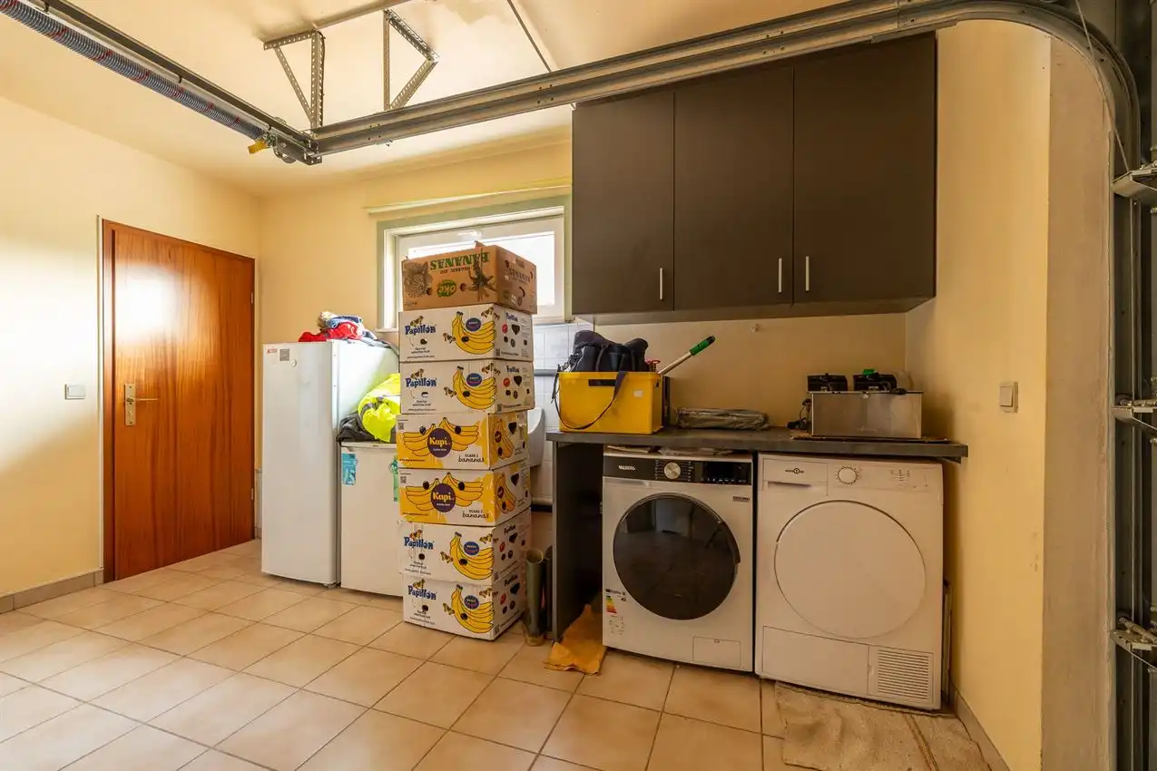 Gelijkvloerse woning EPC B met inpandige garage en gezellige tuin foto 13