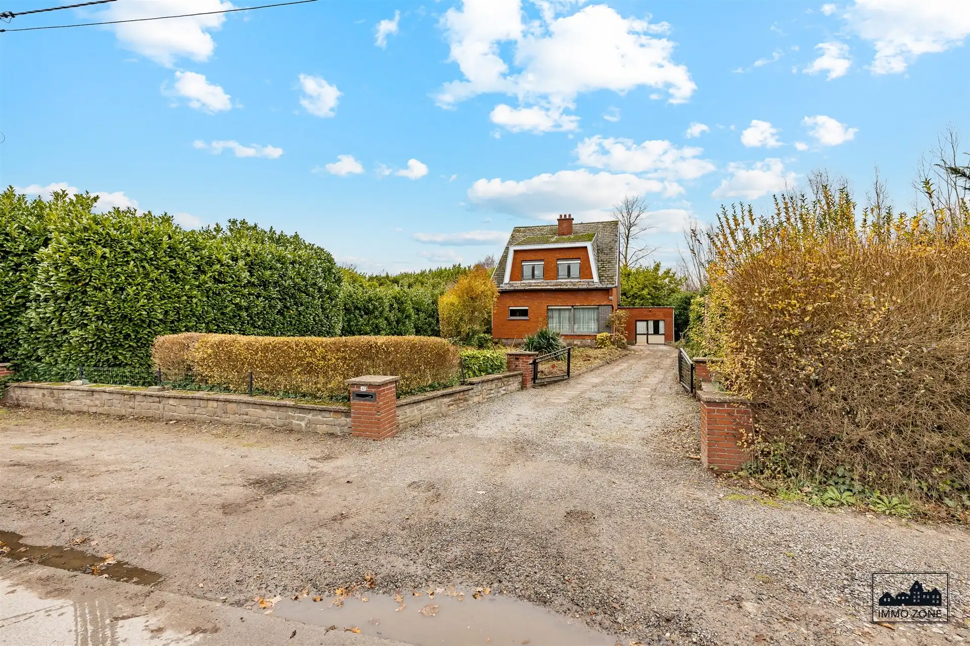 Te renoveren woning op ruim perceel met groene zone foto 18