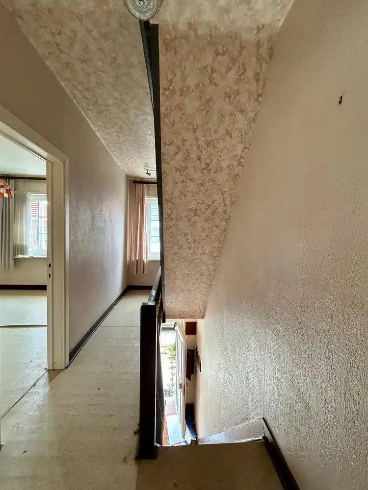 Volledig te renoveren rijwoning met veel potentieel op toplocatie in Kessel-Lo foto 13