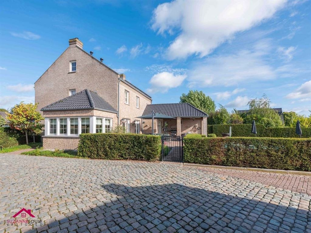 Landelijke villawoning met dubbele vrijstaande garage foto 7