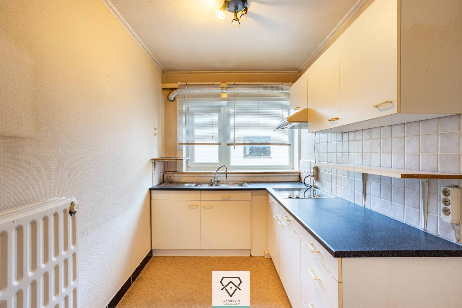 Opbrengsteigendom met 4 appartementen en 2 dubbele garageboxen te koop foto 10