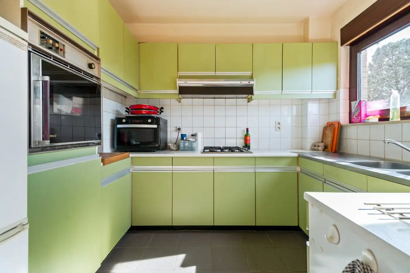 Op te frissen woning met 3 slpk., inpandige garage en west-tuin foto 10