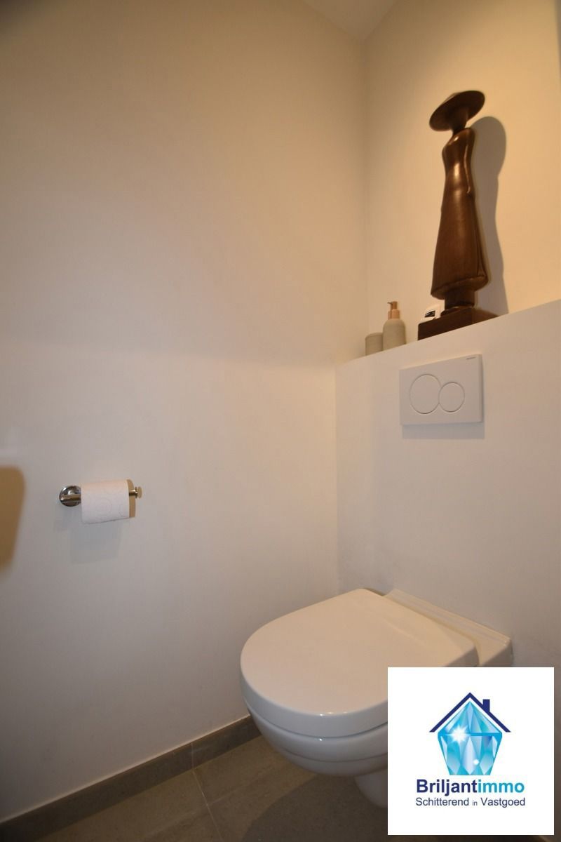 Energiezuinig gelijkvloers appartement met 3 slpkmrs & tuin foto 10