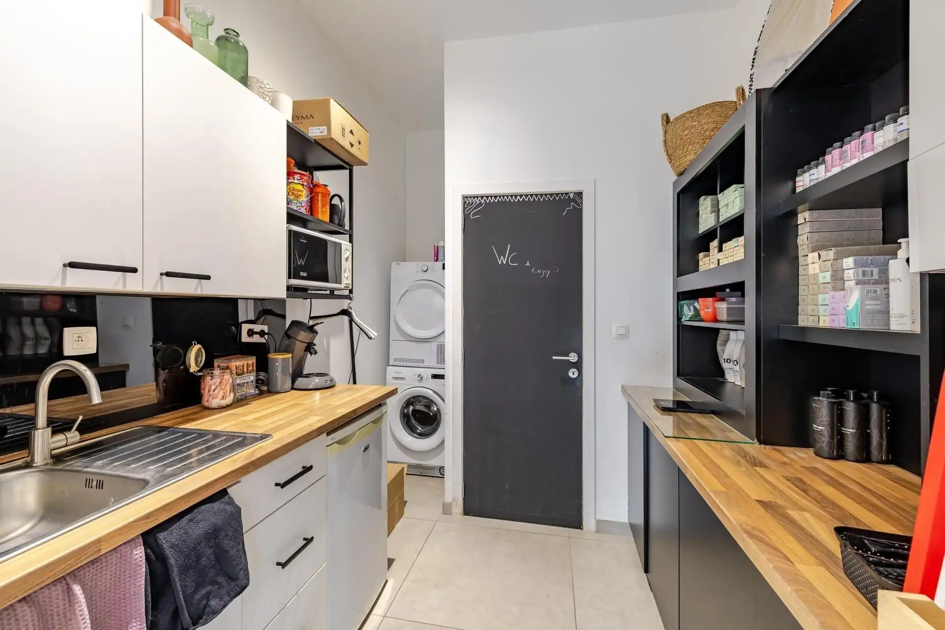 Stijlvol handelspand met kwalitatieve afwerking en charmant appartement met terras foto 19