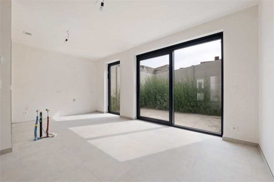 KNAPPE NIEUWBOUWWONING IN HET CENTRUM VAN BORGLOON (MOGELIJKHEID AANKOOP 6% BTW) foto 18