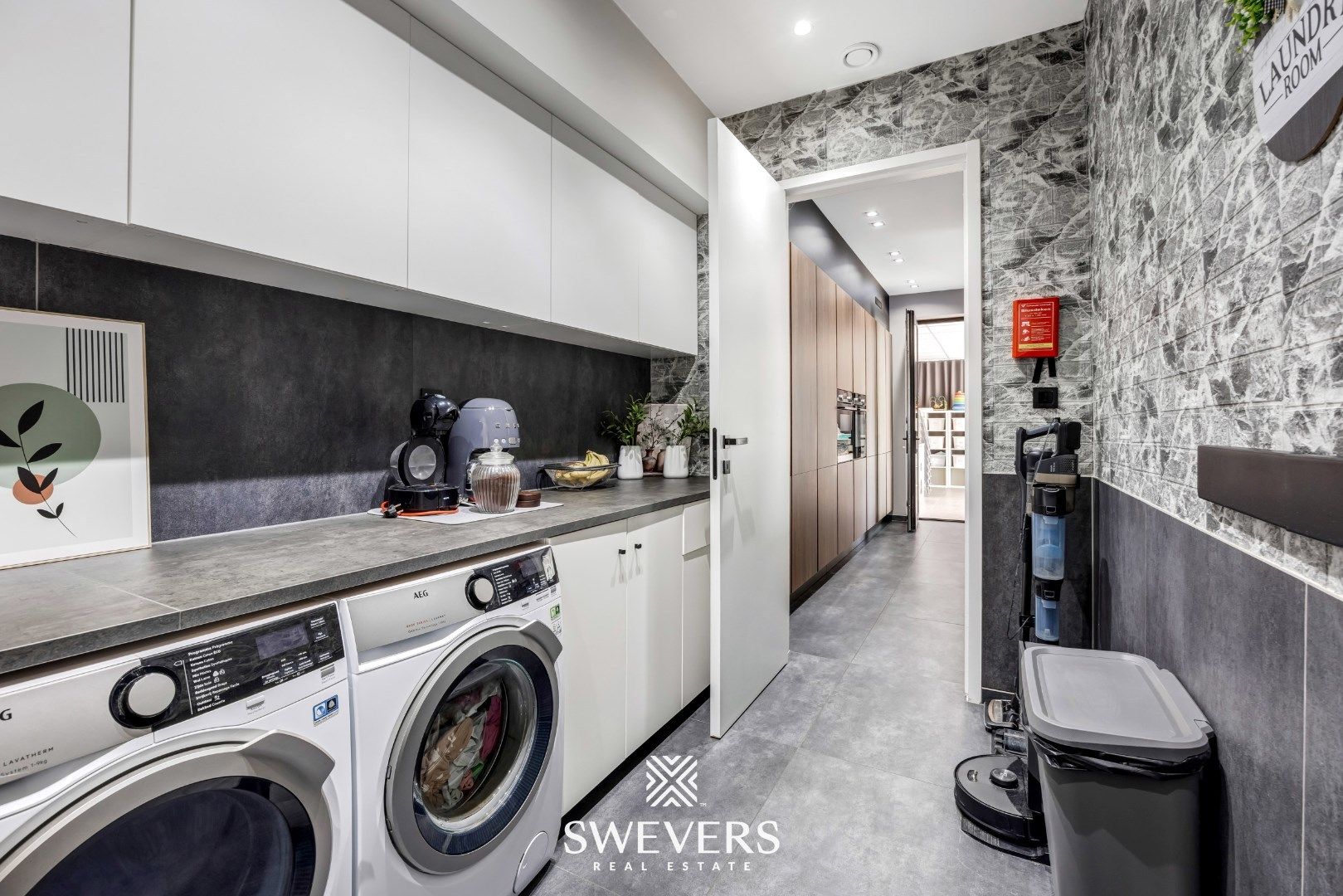 Stijlvol wonen op een ruim perceel met 4 slaapkamers en topafwerking foto 21