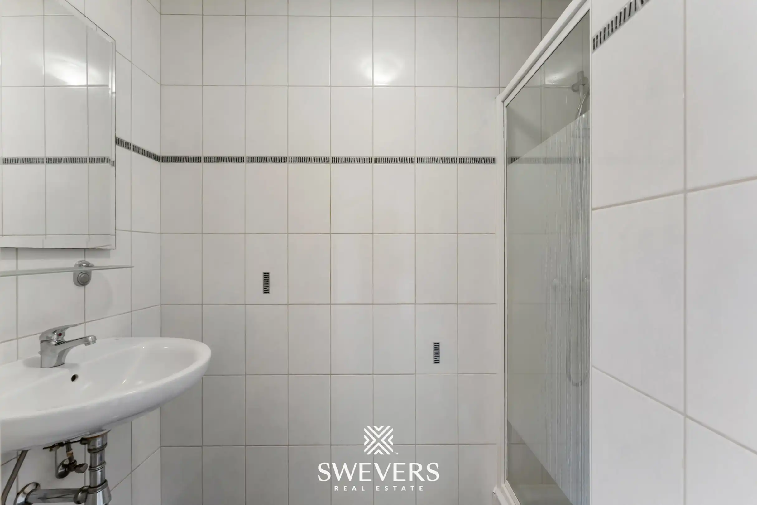 Ruim duplex appartement met 2 slaapkamers en tuin foto 11