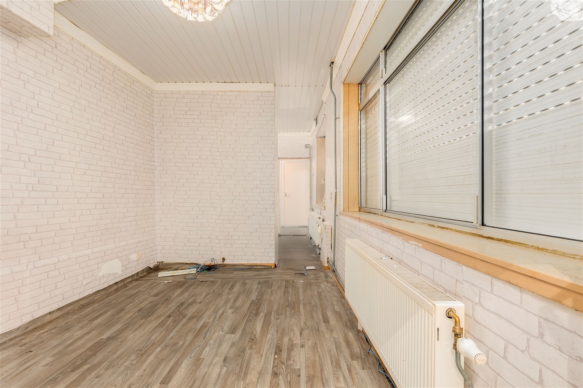 Te renoveren woning 2 slpk met garage foto 7