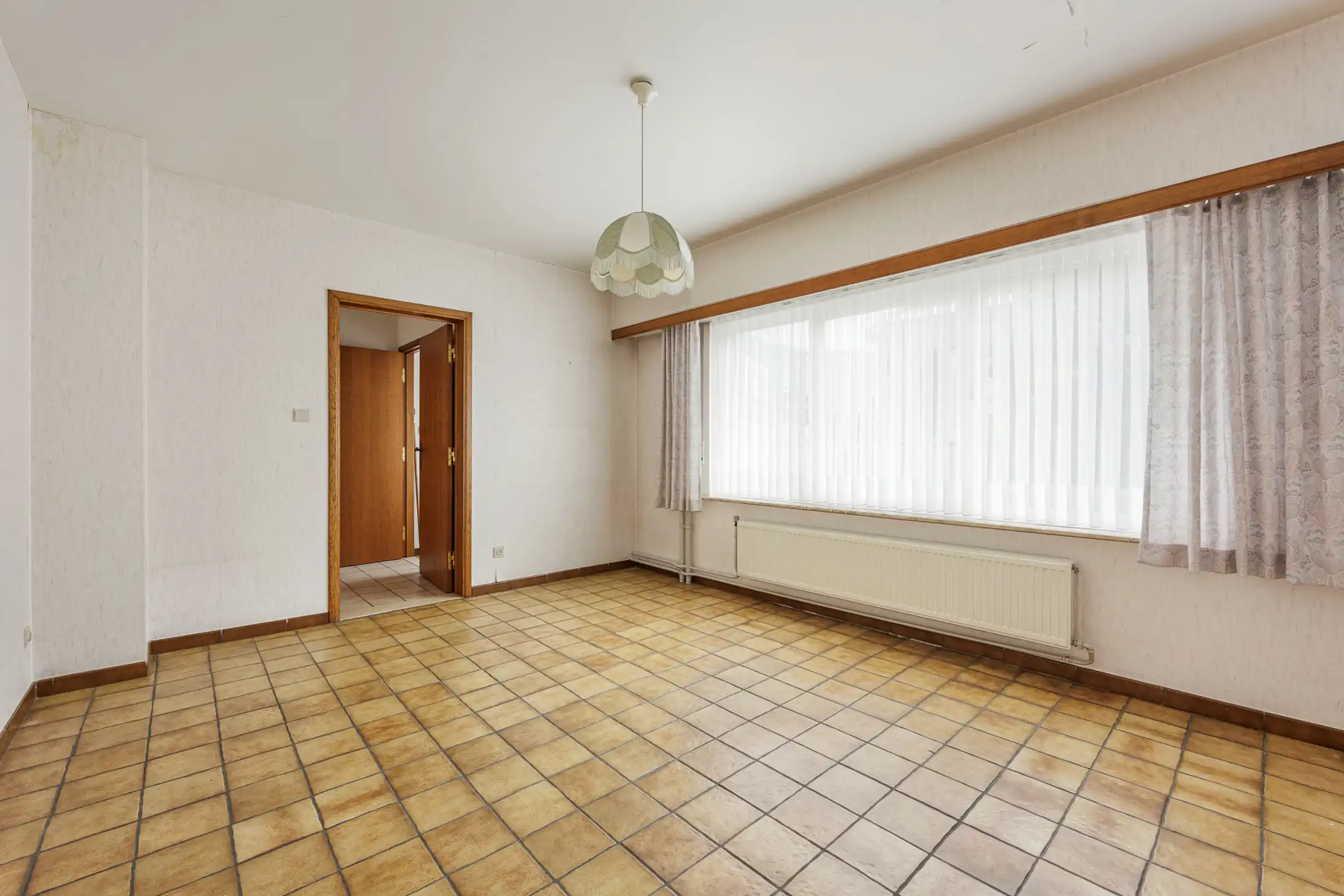 Te renoveren 3slpk-woning met 2 garages & tuin nabij centrum foto 15
