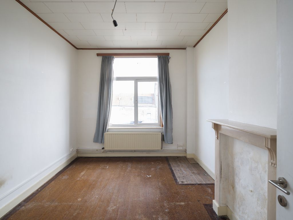 Te renoveren woning met atelier/loods, ruime tuin en bijzonder veel potentieel op een boogscheut van het stadscentrum. foto 14