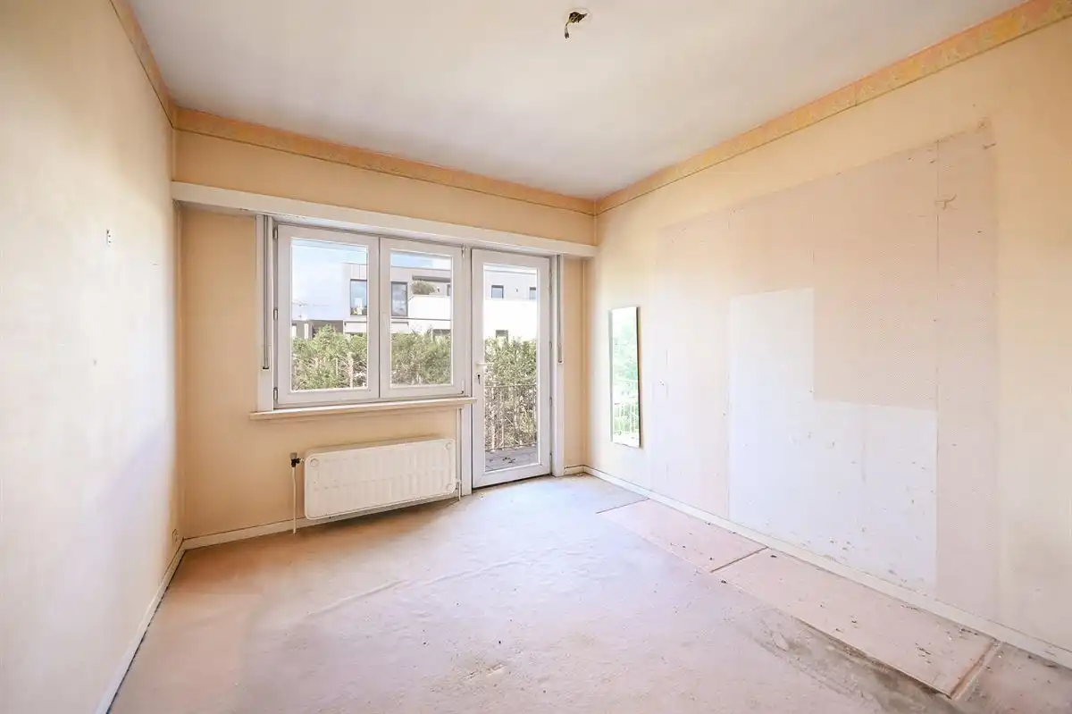 Lichtrijk te renoveren hoekappartement in hartje Brasschaat foto 23