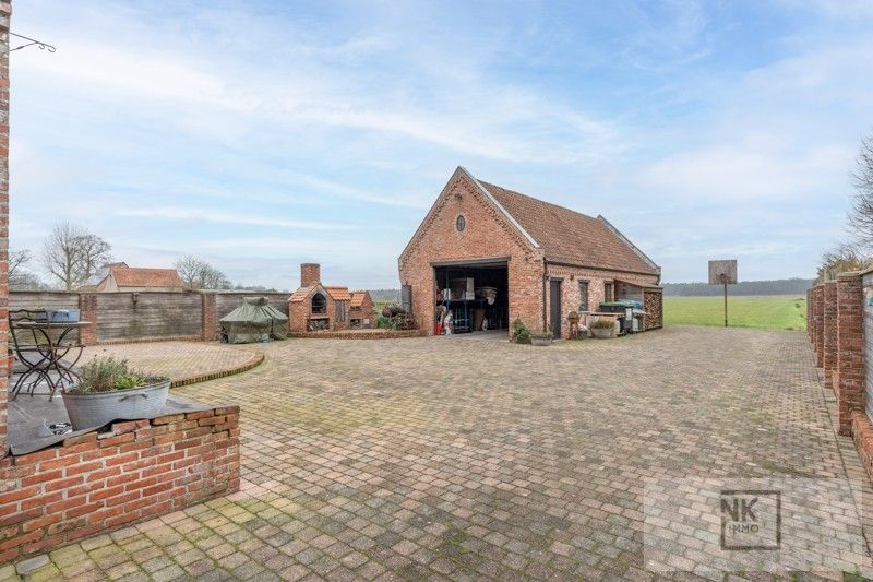 Charmante fermette woning met 4 slaapkamers, bureau en ruime werkplaats op een prachtig perceel in Arendonk! foto 40