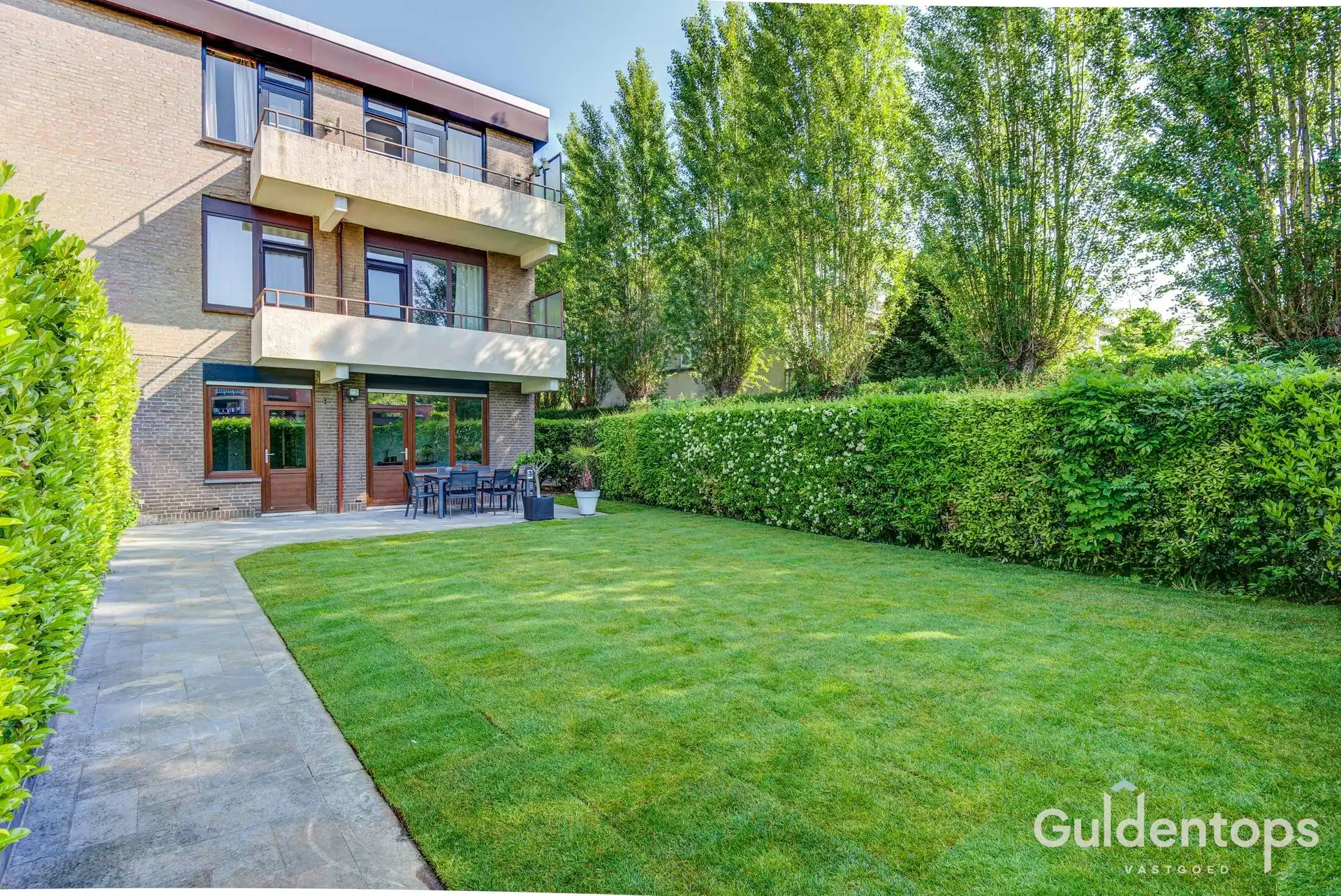 Modern ruim gelijkvloers (2 slk) appartement met ruime tuin foto 27