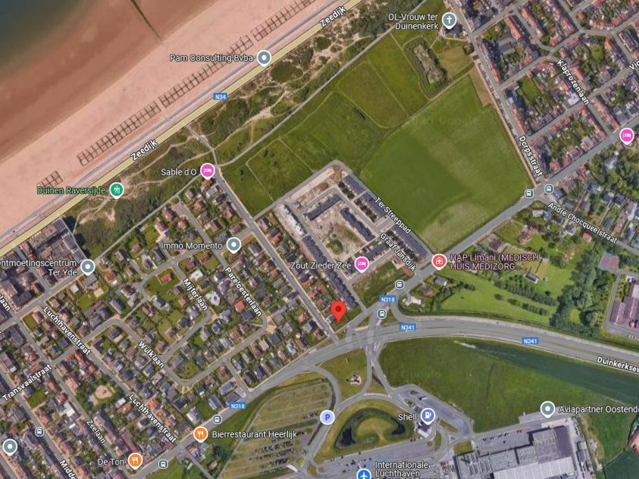 Nieuwbouw half-open woning te koop vlak aan de duinen in een rustige woonwijk te Oostende! foto 2