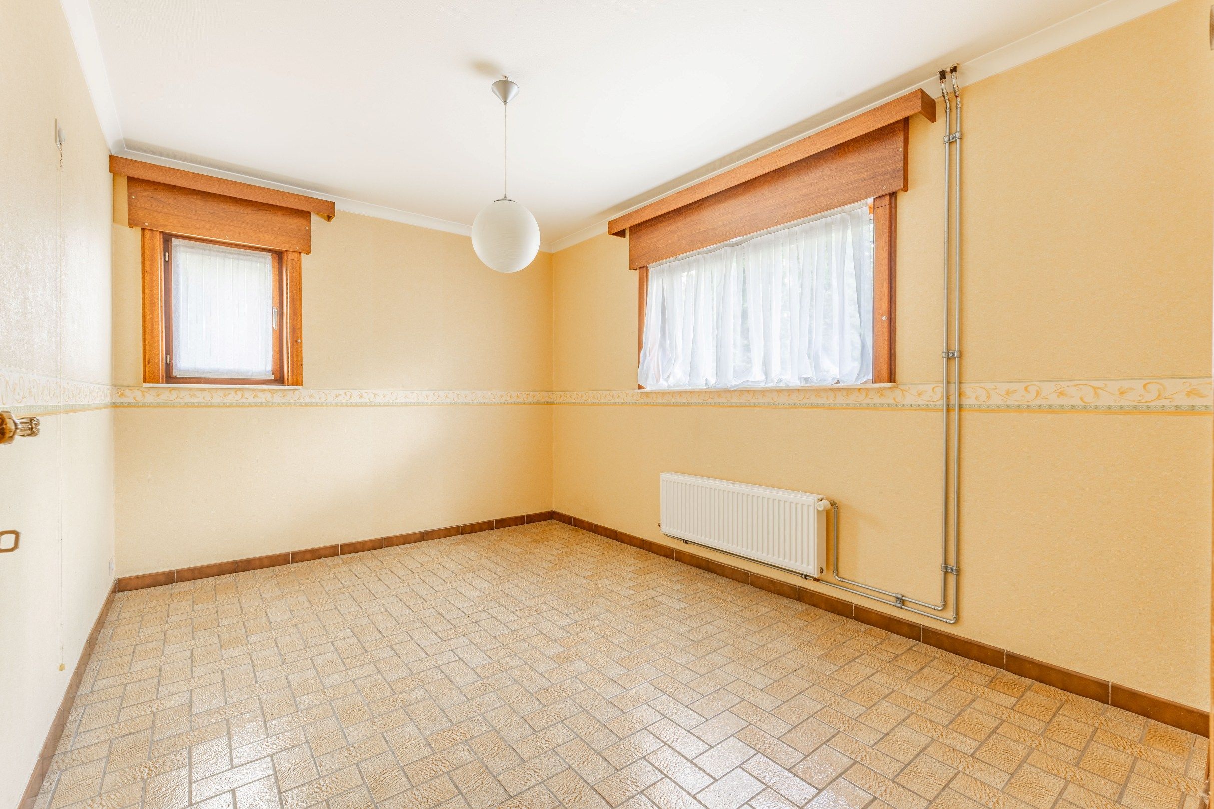 TRAPLOZE WONING MET ZONNIGE TUIN foto 13