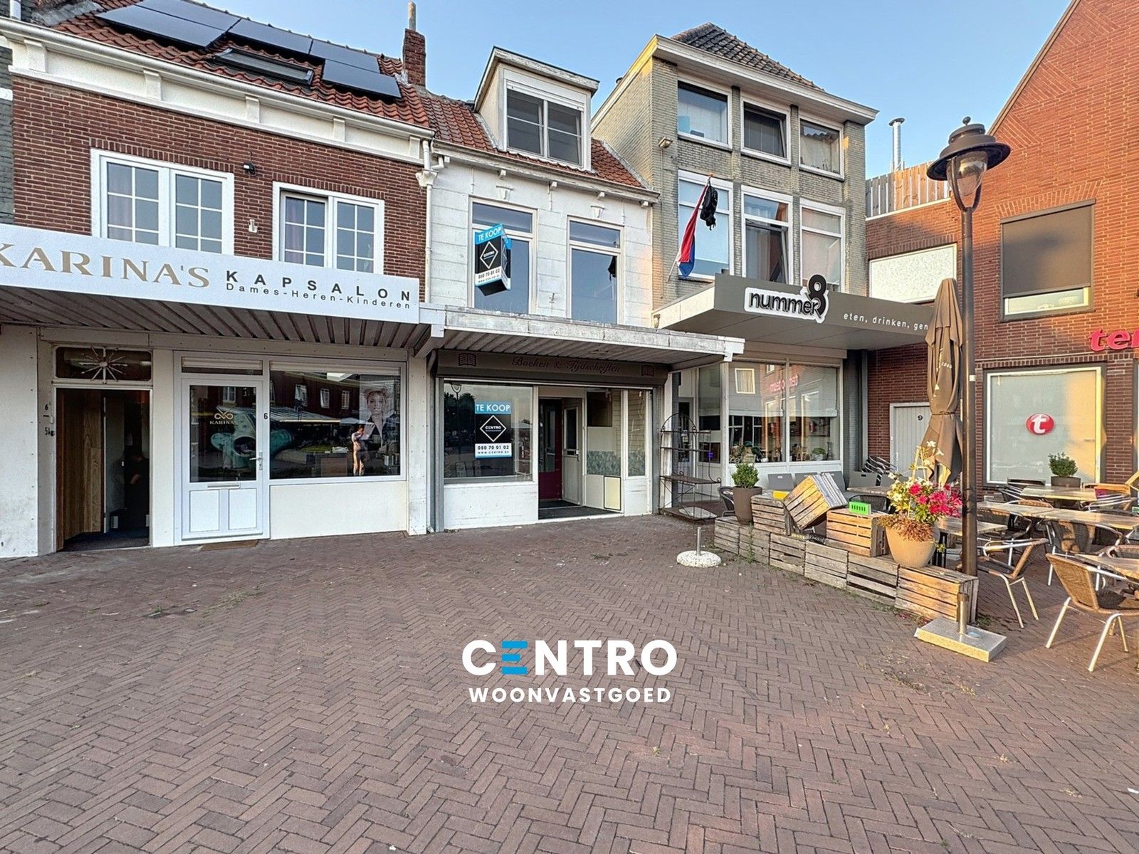 Handelspand met woonst met uitzicht over de Markt! foto {{pictureIndex}}