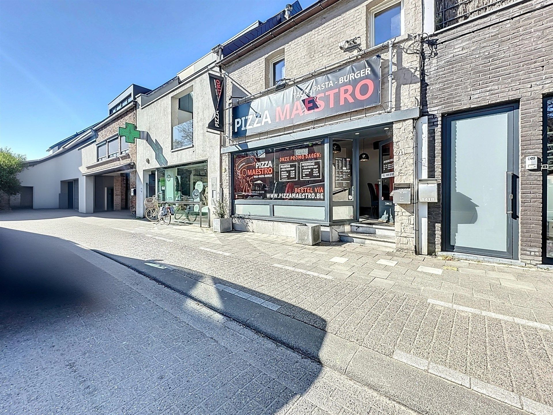 Commerciële ruimte/handelspand gelegen in hartje Belsele. foto 5
