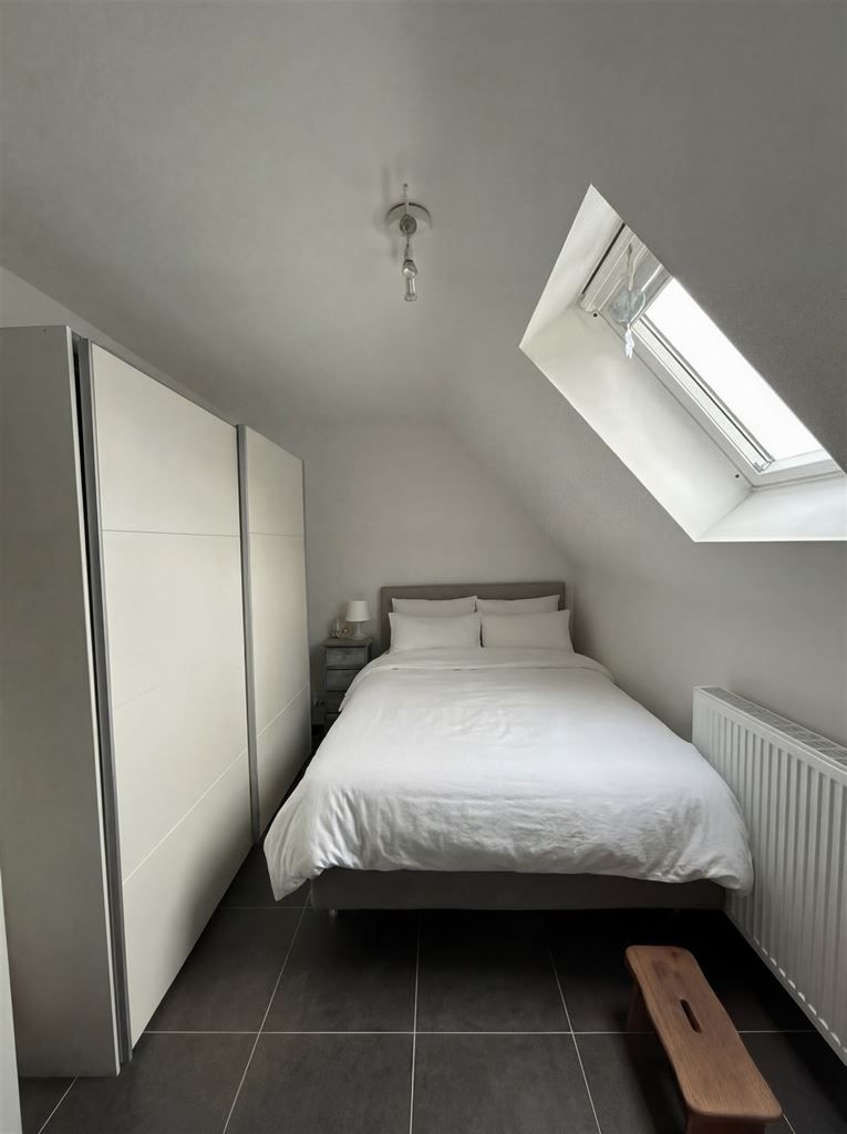 Gezellige stadswoning met 2 slaapkamers en koer, in het centrum van Maaseik. foto 8