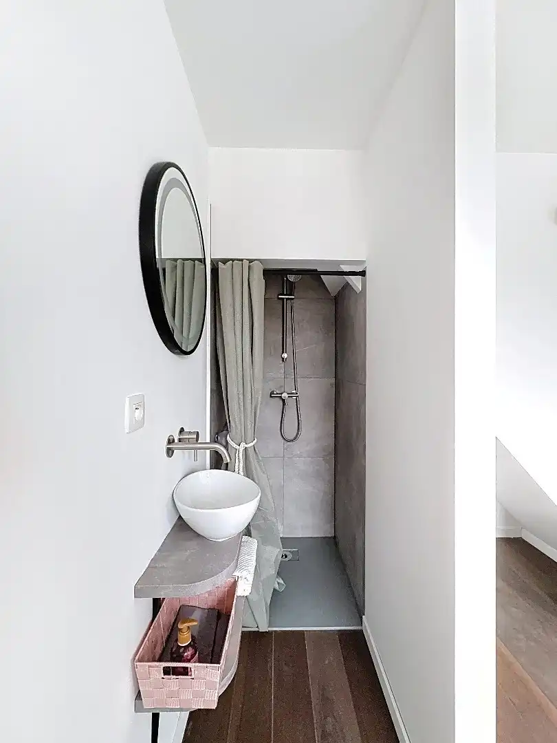 Elegant wonen in Tienen: gerenoveerde rijwoning met 3 slaapkamers en zuidwestgerichte tuin. foto 14