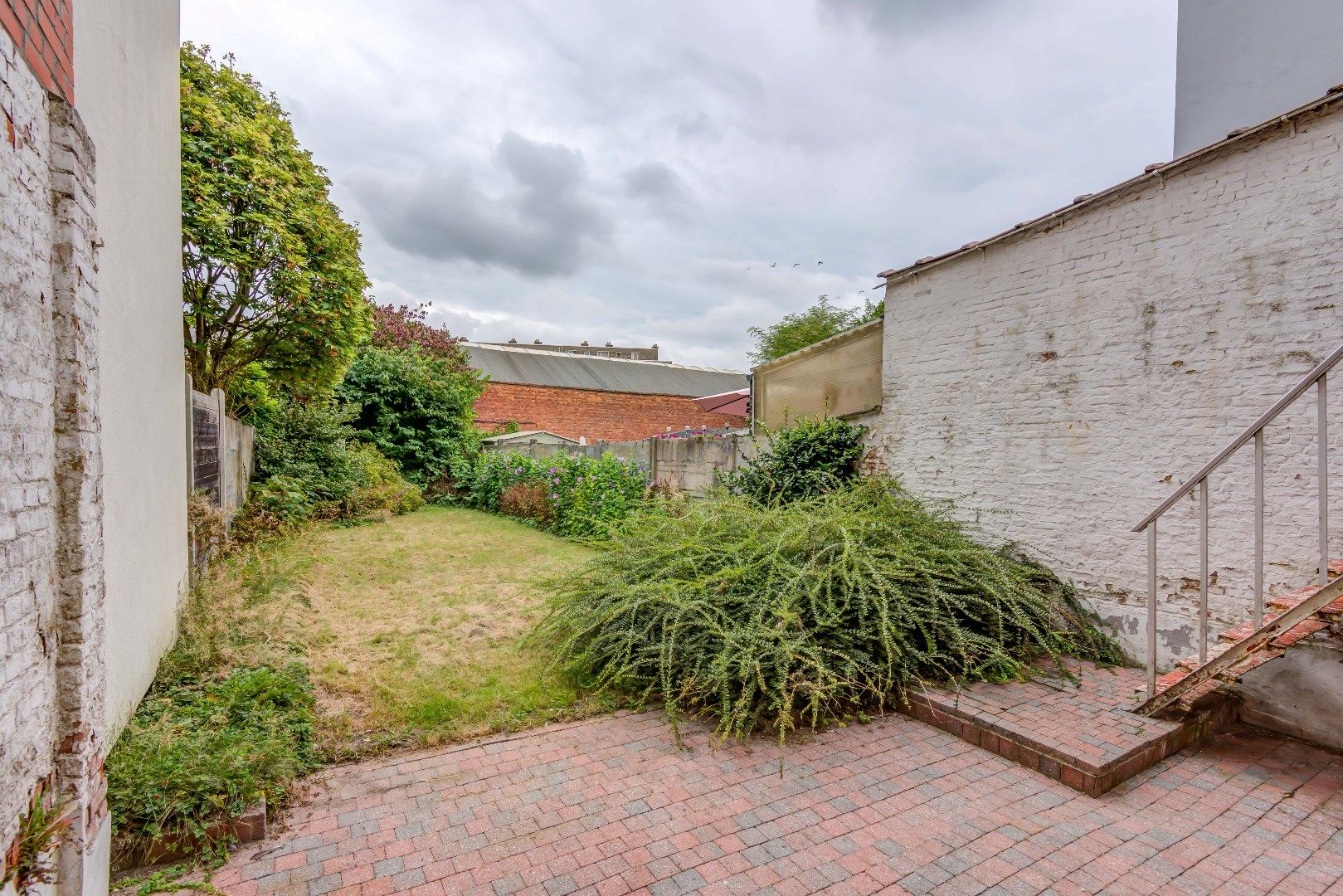 Rijwoning met 3 slaapkamers , garage en tuin foto 18