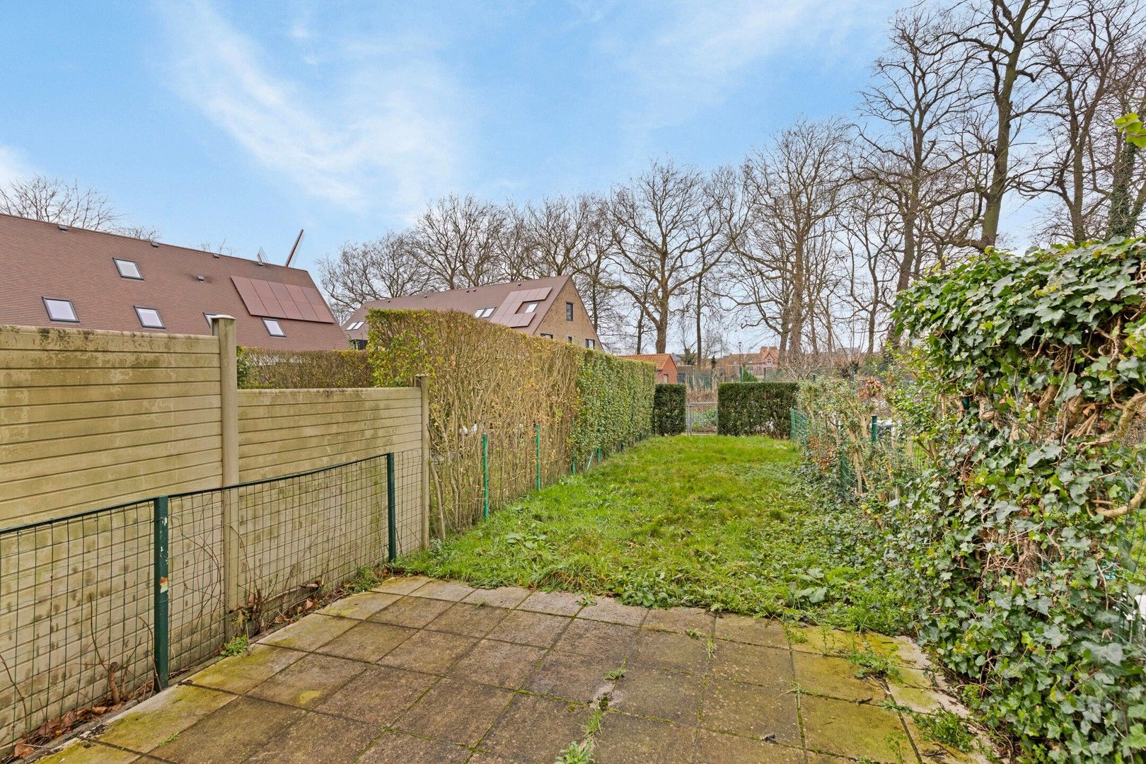 Charmante stadswoning met tuin pal aan de Kruisvest foto 3