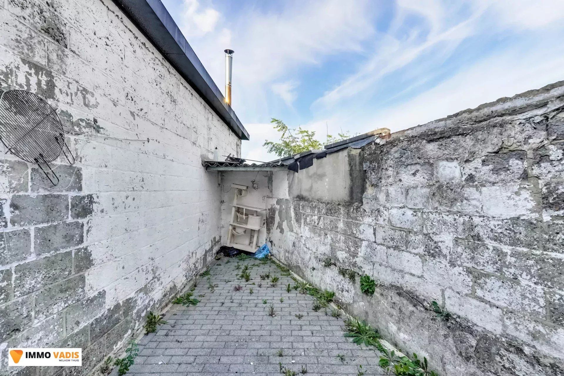 Handelspand met woonst en naastliggende woning foto 21