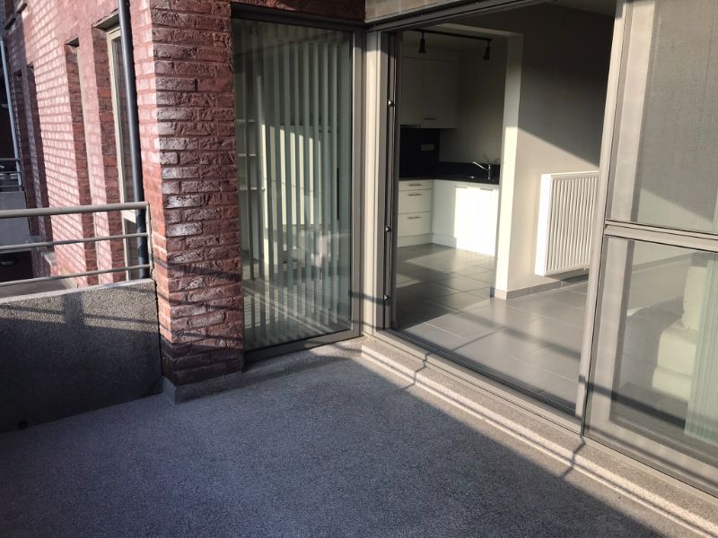 Rustig en zon georiënteerd, instapklaar 2 slk appartement met terras, private garage en dichtbij het Station van Denderleeuw en winkels foto 8