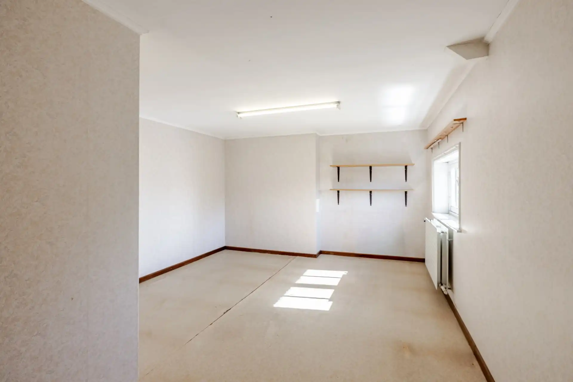 Te renoveren woning met 3 slks en zuidgerichte tuin foto 22