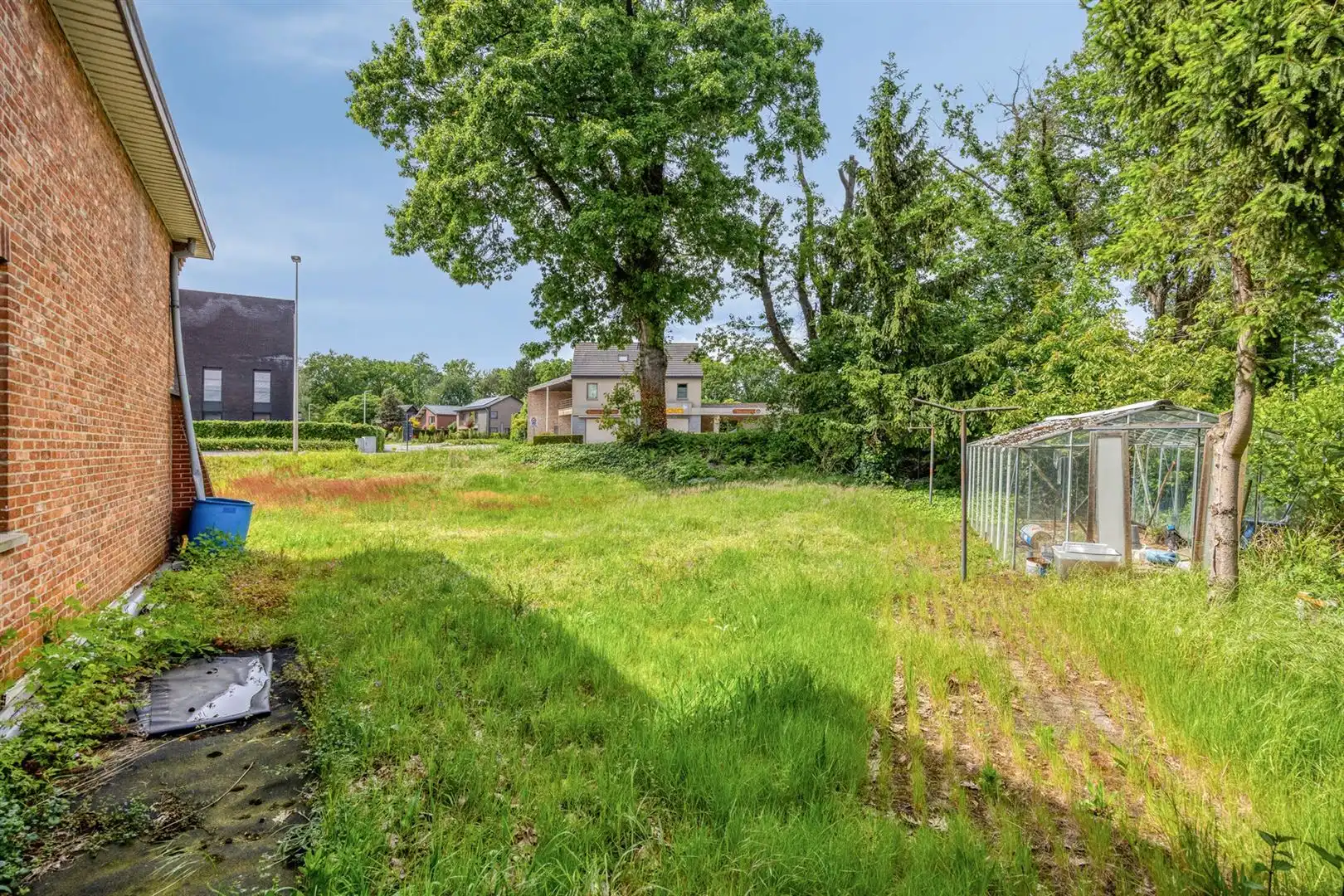 TE KOOP: Te renoveren woning met ruim perceel en projectmogelijkheden in Lummen! foto 25