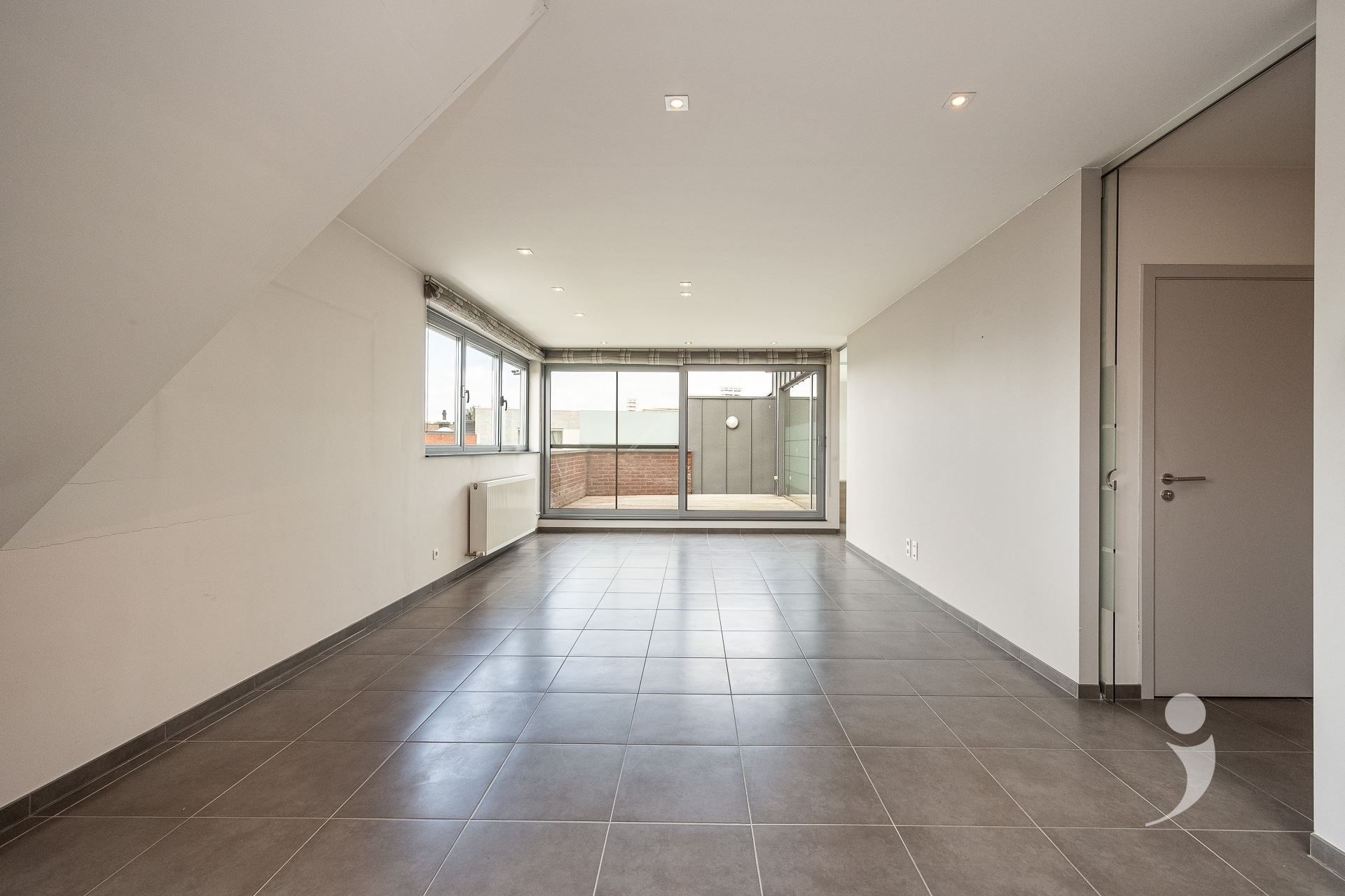 Zeer ruim duplexappartement in hartje Herent! foto 2