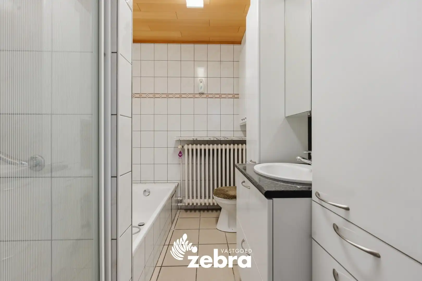Ruime woning met 4 slaapkamers op een perceel van 601 m² te Meulebeke! foto 8