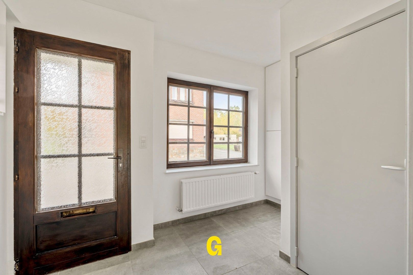 Vakkundig gerenoveerde woning met binnenkoer, tuin en bijgebouwen op 4a 62ca - EPC label B foto 6