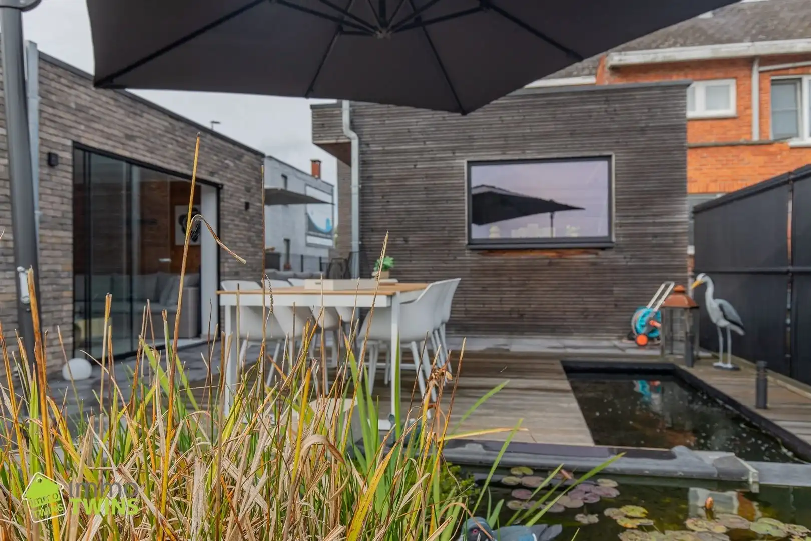 Instapklare en stijlvolle HOB met bijgebouw, tuin en visvijver te Dendermonde (Schoonaarde) foto 14