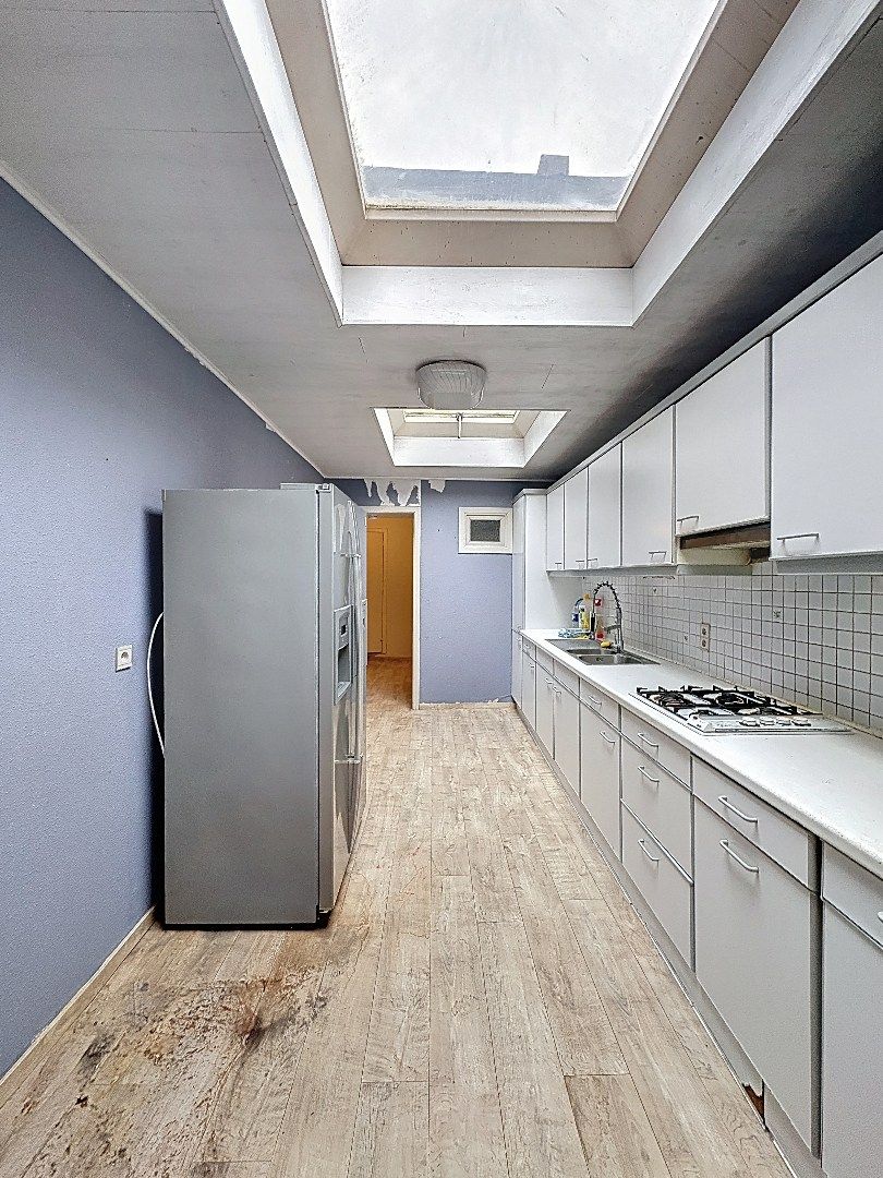 Charmant pand met handelsruimte en woonst in hartje Tienen foto 11