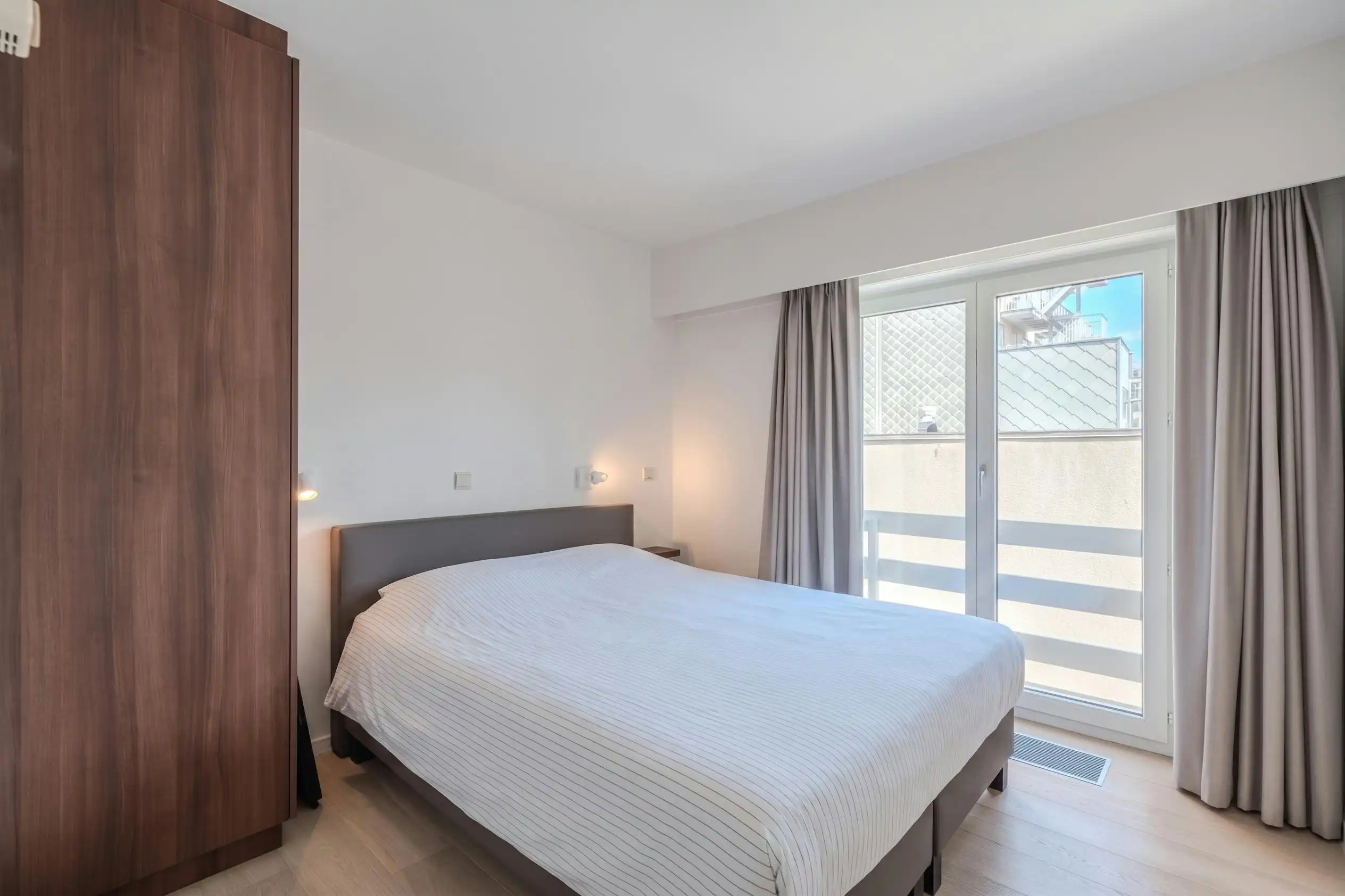 Ruim 2 slaapkamer appartement met zonneterras en zeezicht! foto 11