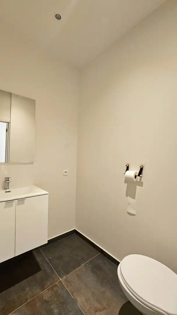 Appartement op het gelijkvloers met koer foto 5