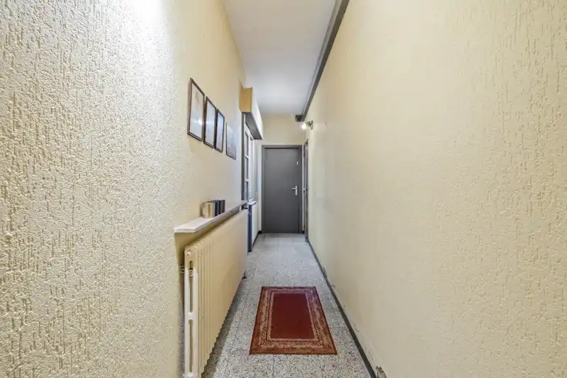 Karaktervolle hoekwoning met 5 slaapkamers en polyvalente handelsruimte foto 6