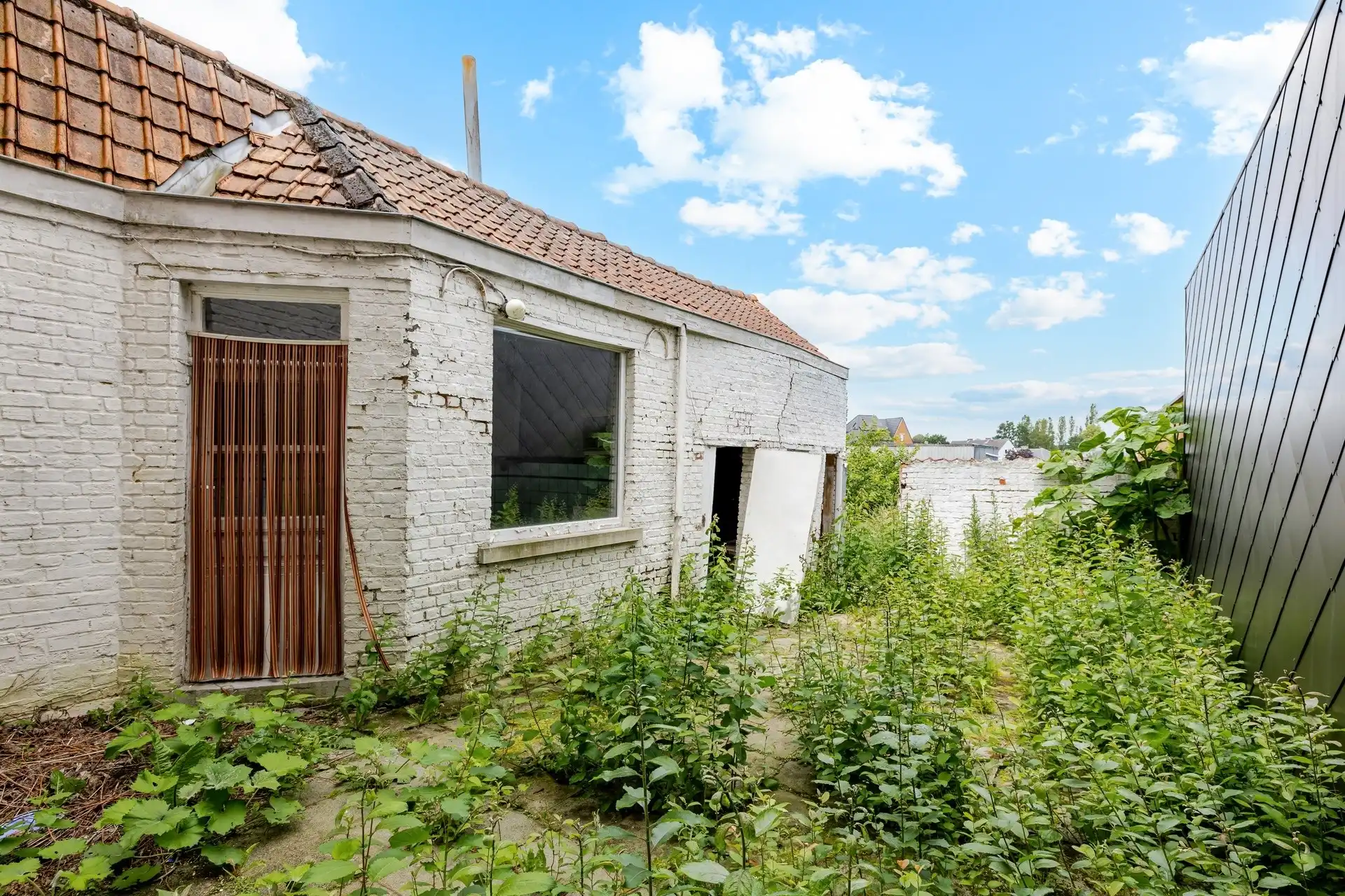 Te renoveren woning met grote tuin en garage te Haaltert foto 12