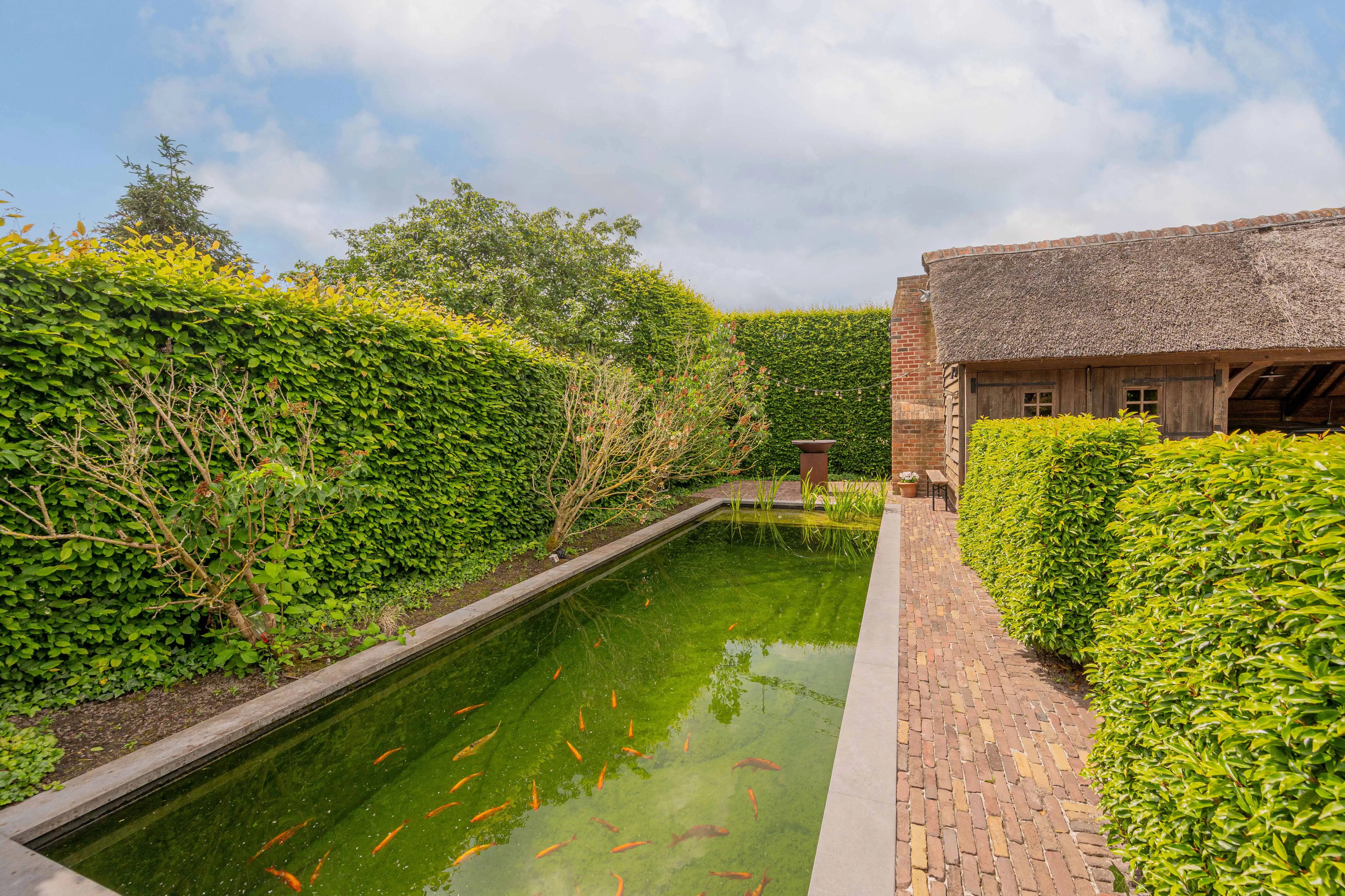 Exclusieve high-end gezinswoning prachtige tuin foto 4
