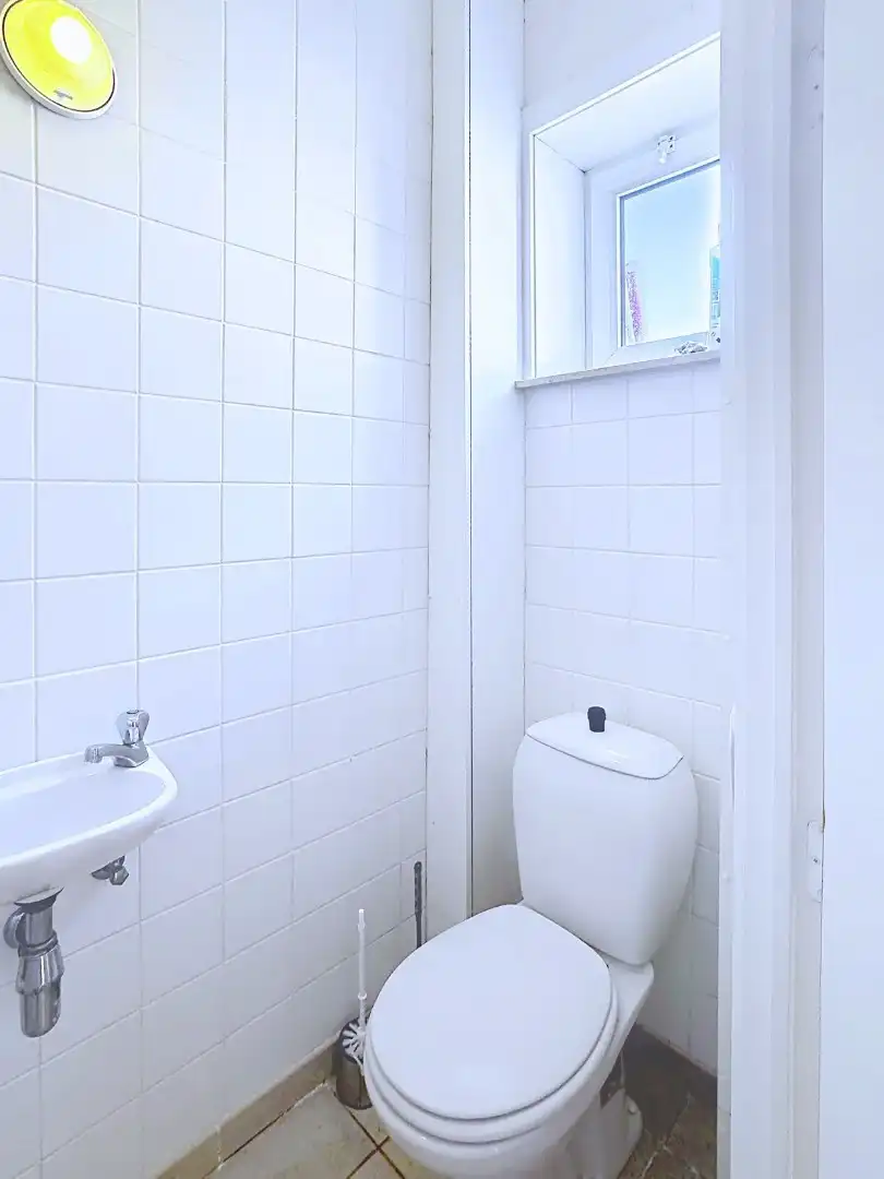 Handelspand/praktijkruimte gelegen in de dorpskern van Merendree foto 7