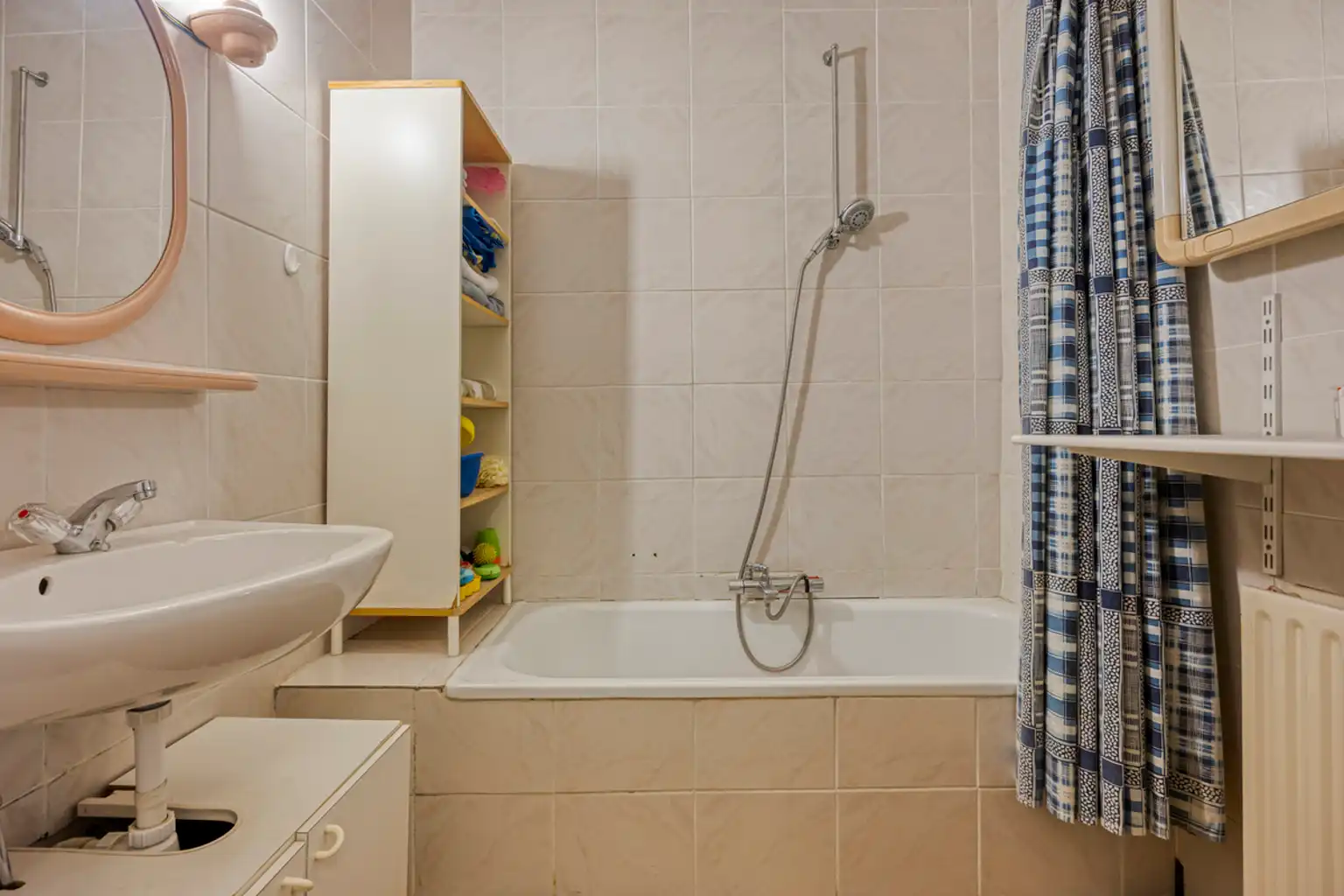 Instapklaar en lichtrijk 2-kamerappartement met garagebox  foto 13