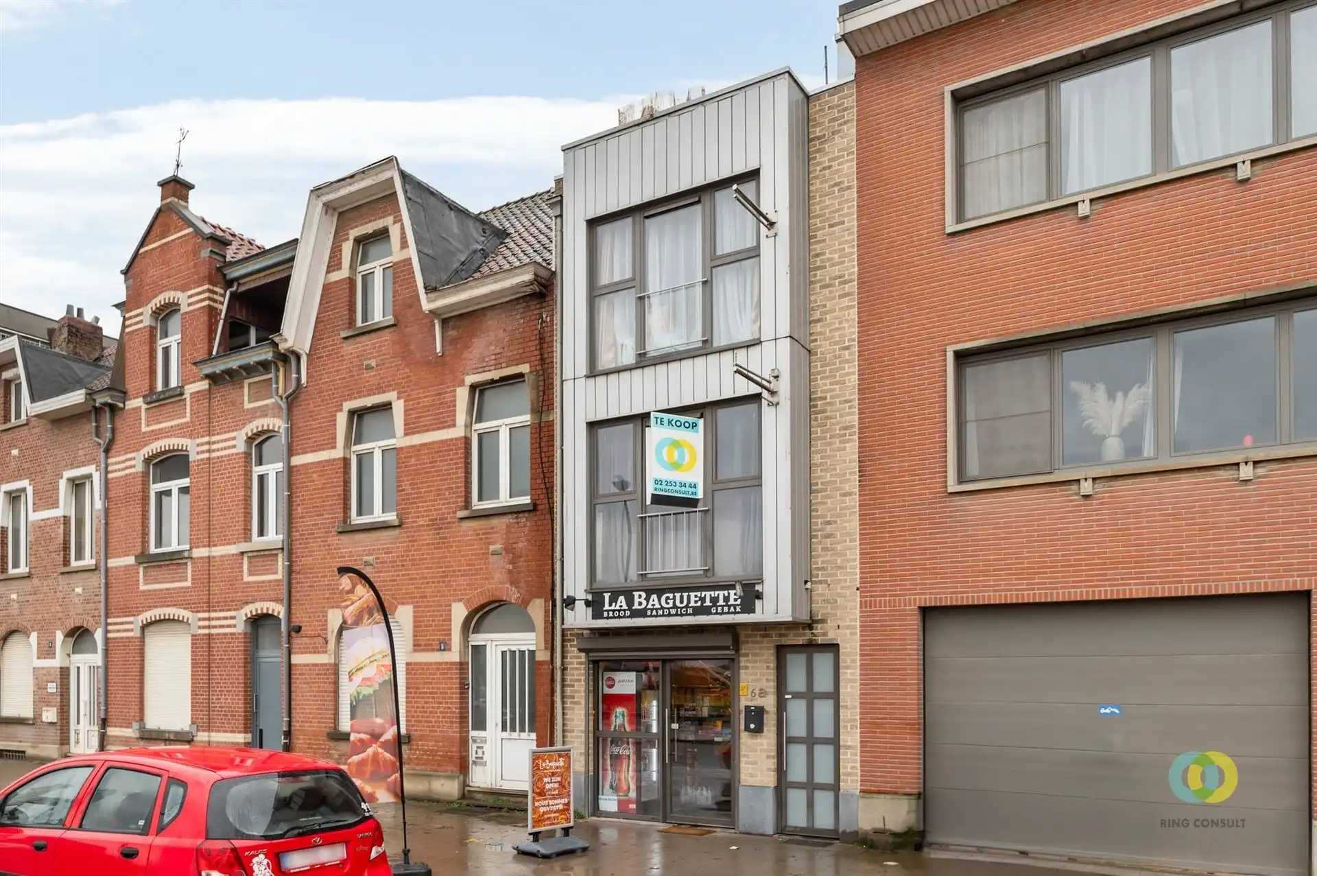 Woning met commercieel gelijkvloers en een goed rendement foto 14