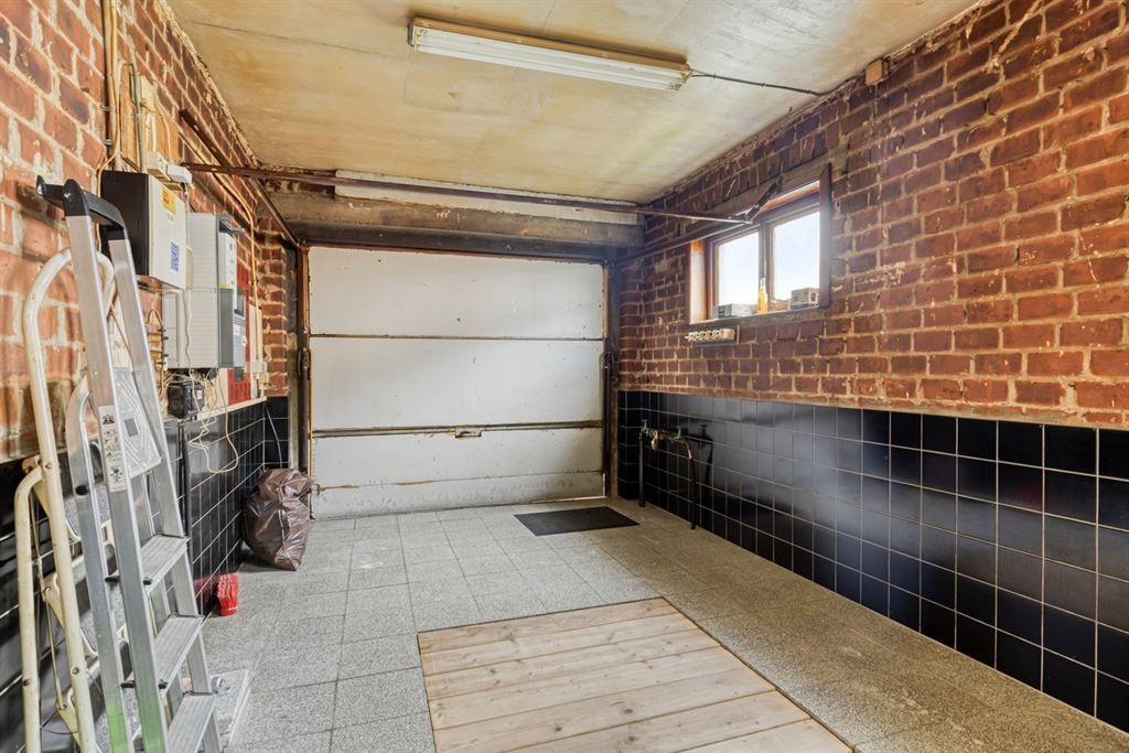 Op te frissen woning te Wilsele!  foto 16