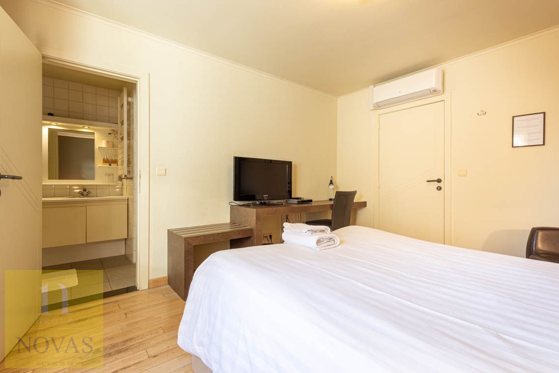 Authentiek handelspand / hotel met restaurant, feestzaal en mooie tuin op ideale locatie. foto 14