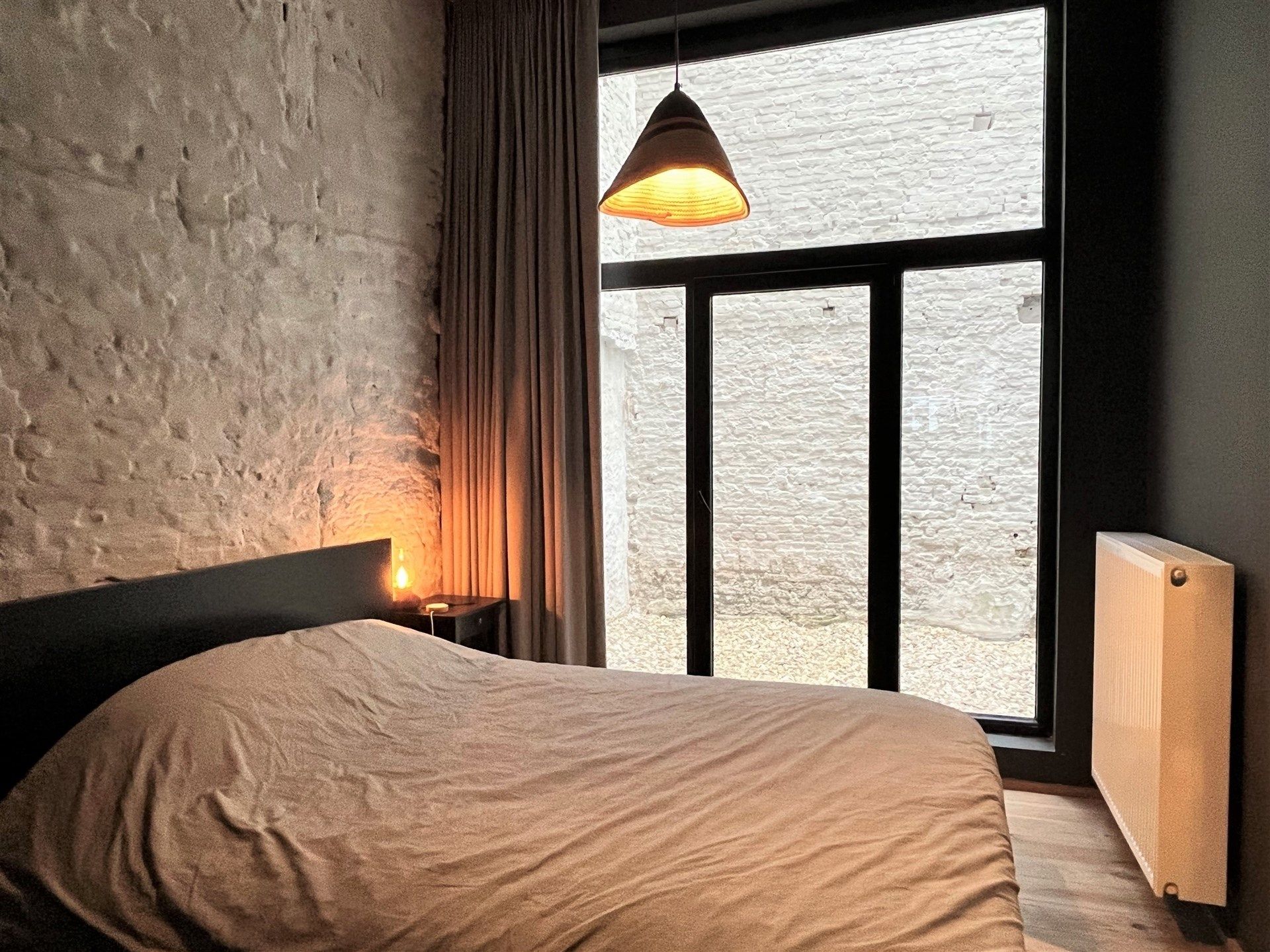 Gelijkvloers gemeubeld appartement op het Eilandje! foto 5